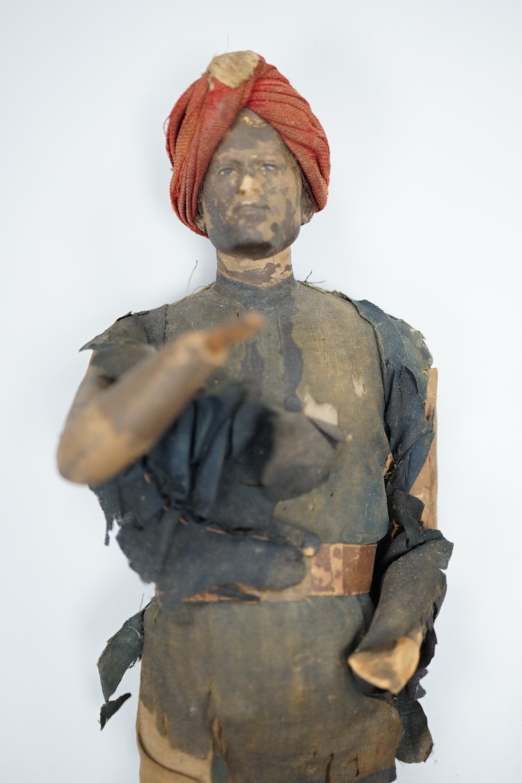 Two Indian clay figures, 26cm high